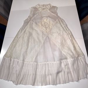 Free People Lace High Neck with cutout back.